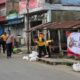 Jelang HUT Bhayangkara ke-80, Polres Karo Bersihkan Pusat Pasar Kabanjahe dalam Gerakan Indonesia Asri